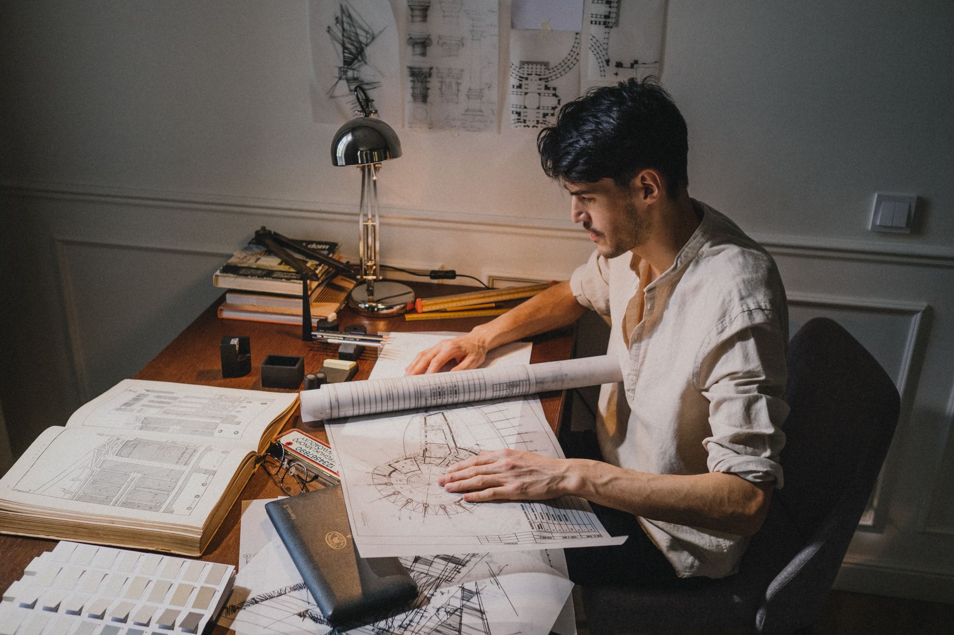 Architectural blueprint on desk